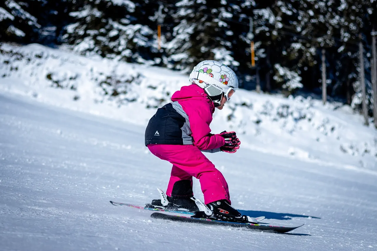 Do you have to wear a helmet by law when skiing in Austria?