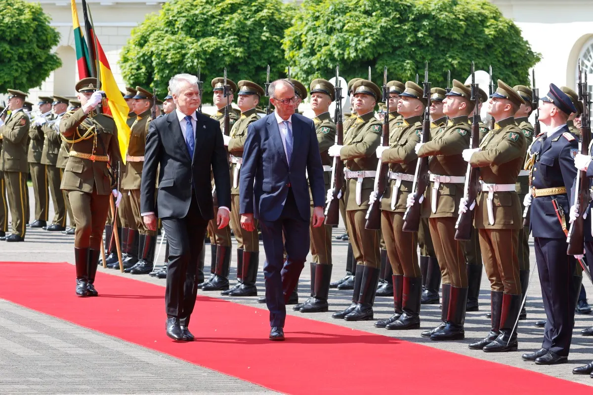 German Chancellor warns of Russia threat in visit to NATO’s eastern flank