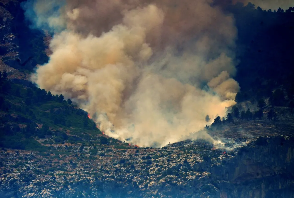 Spain lifts lockdown for thousands as forest fire eases