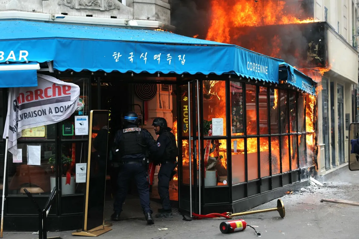 Restaurant fire during Paris demo 'was started accidentally by police'