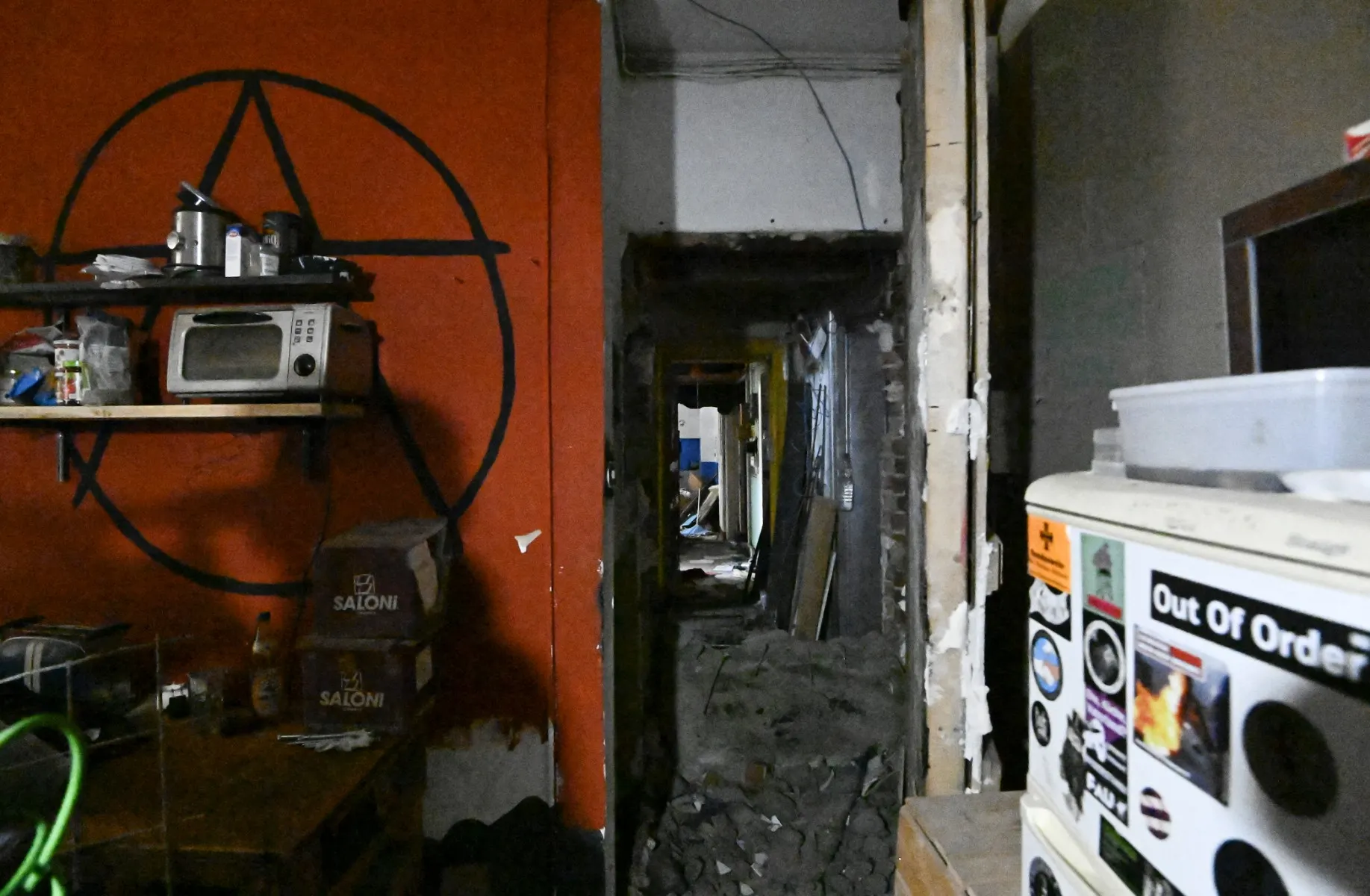 What does anti-squatter insurance cover in Spain?