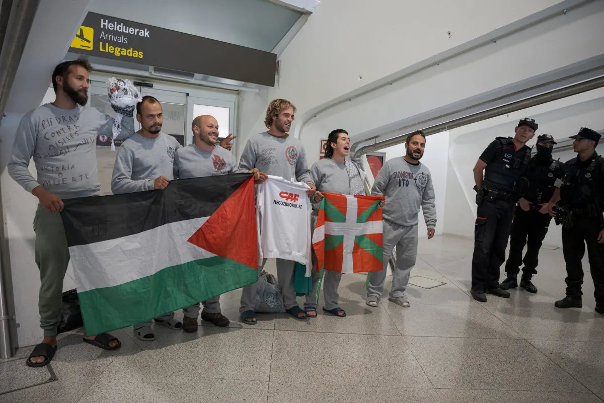 Four held after clashes at Spain airport as Gaza activists return