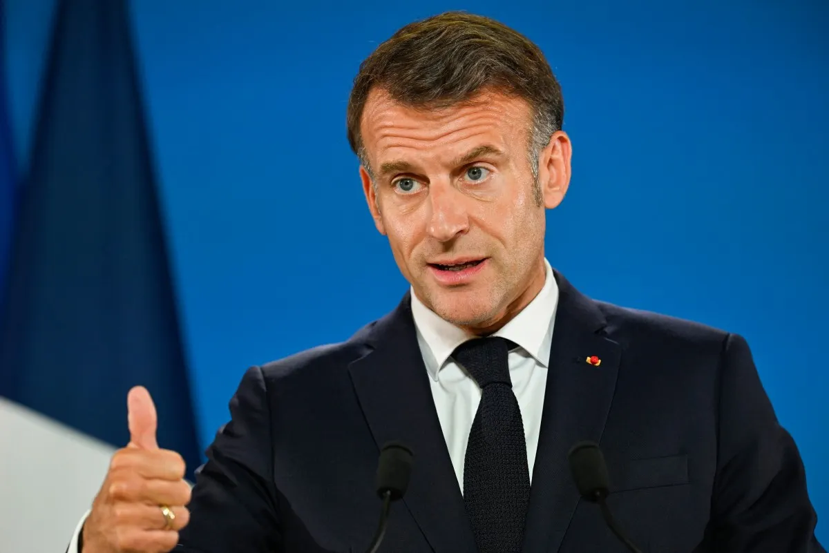 France's Macron slams migrant 'return-hubs', EU funding push