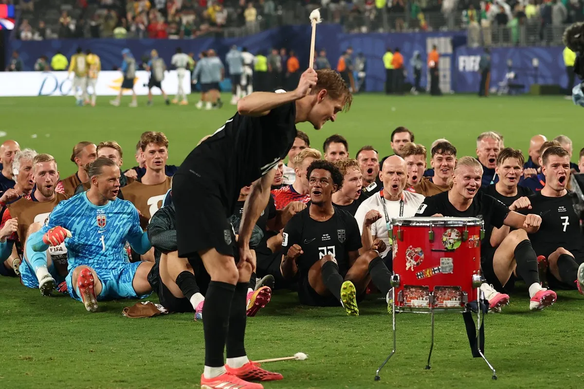 What's the story behind Norway's 'row row' football chant