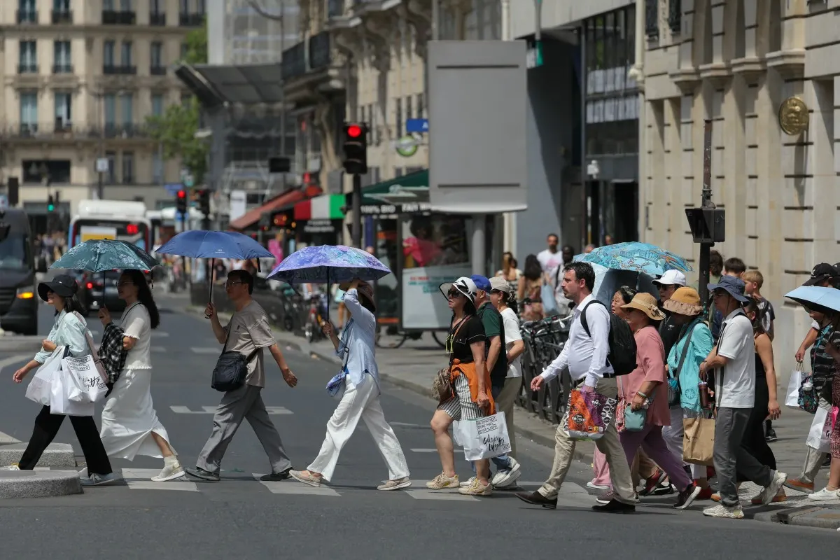 ‘Paris in this heat is awful’: Tourists change plans as sites close early