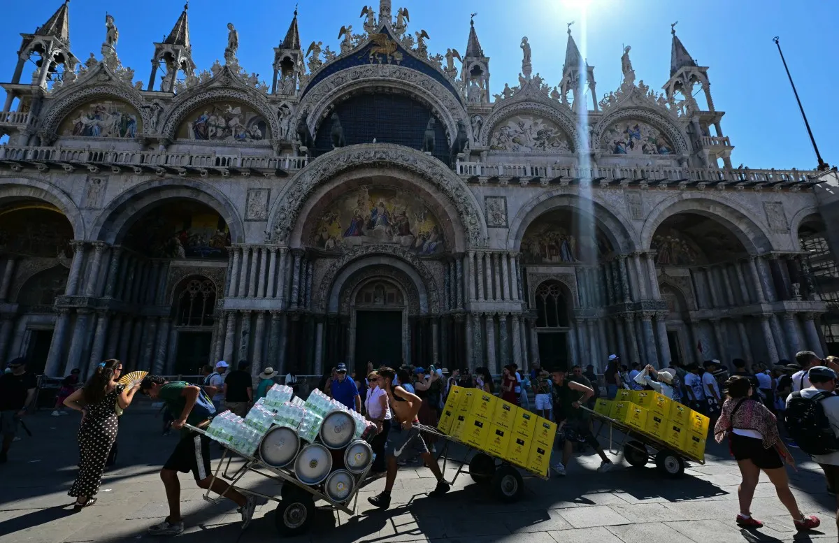 Records tumble as European heatwave moves east