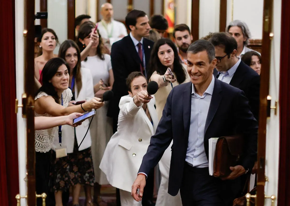 Spain's PM denies Socialist corruption as 'widespread' as media and opponents claim