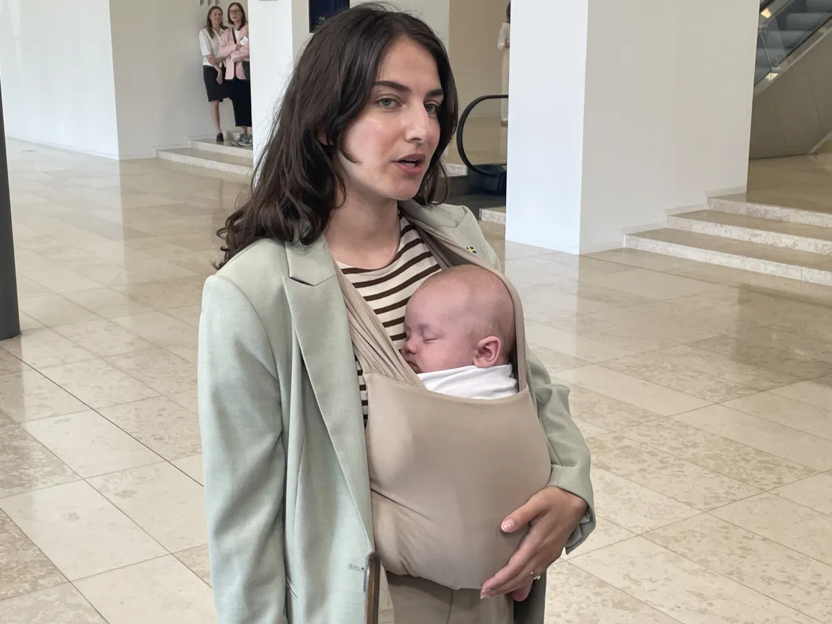 'Present minister and mother': Sweden's environment minister brings baby to EU meeting