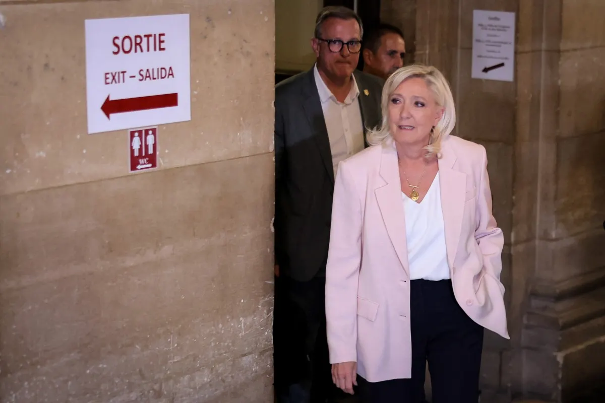 Court shortens Marine Le Pen’s ban, but orders electronic monitoring for presidential bid