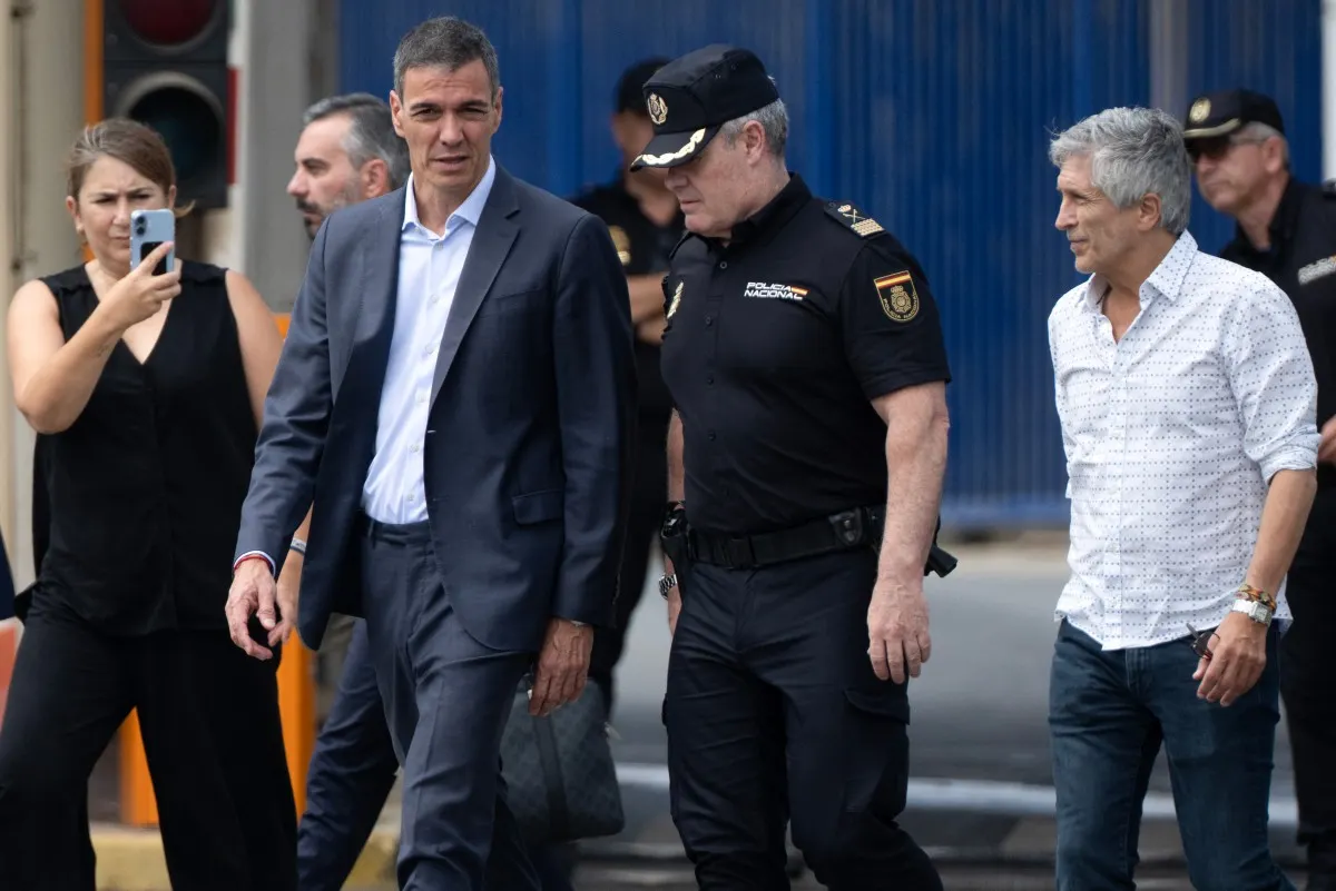 Spain's PM caught out by migrant crisis after weathering wildfires