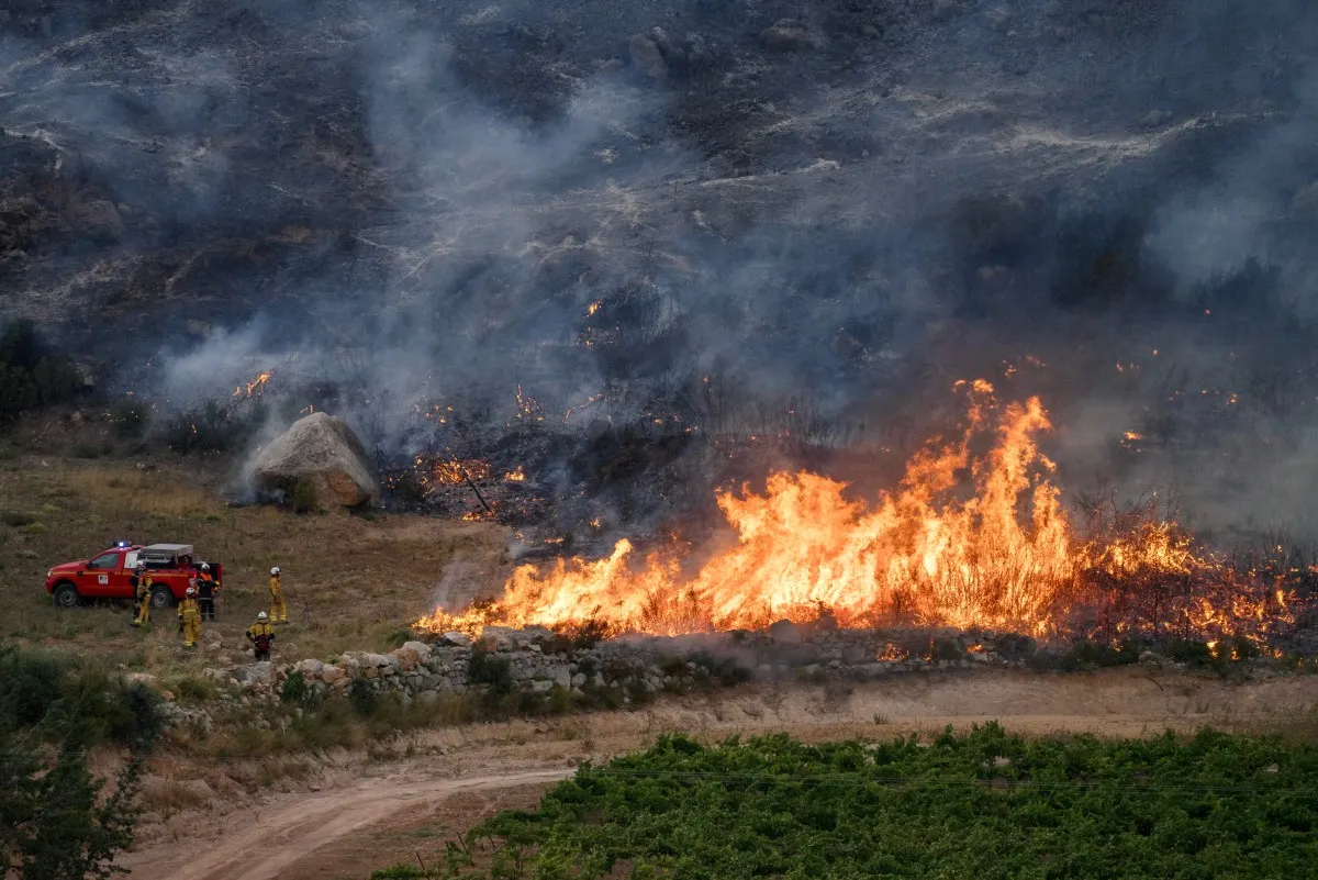 Wildfire in southern France forces evacuations as over 200 firefighters tackle blaze