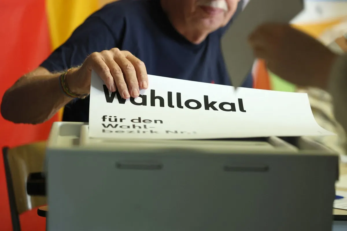Germans vote in elections threatening fresh blow to Merz