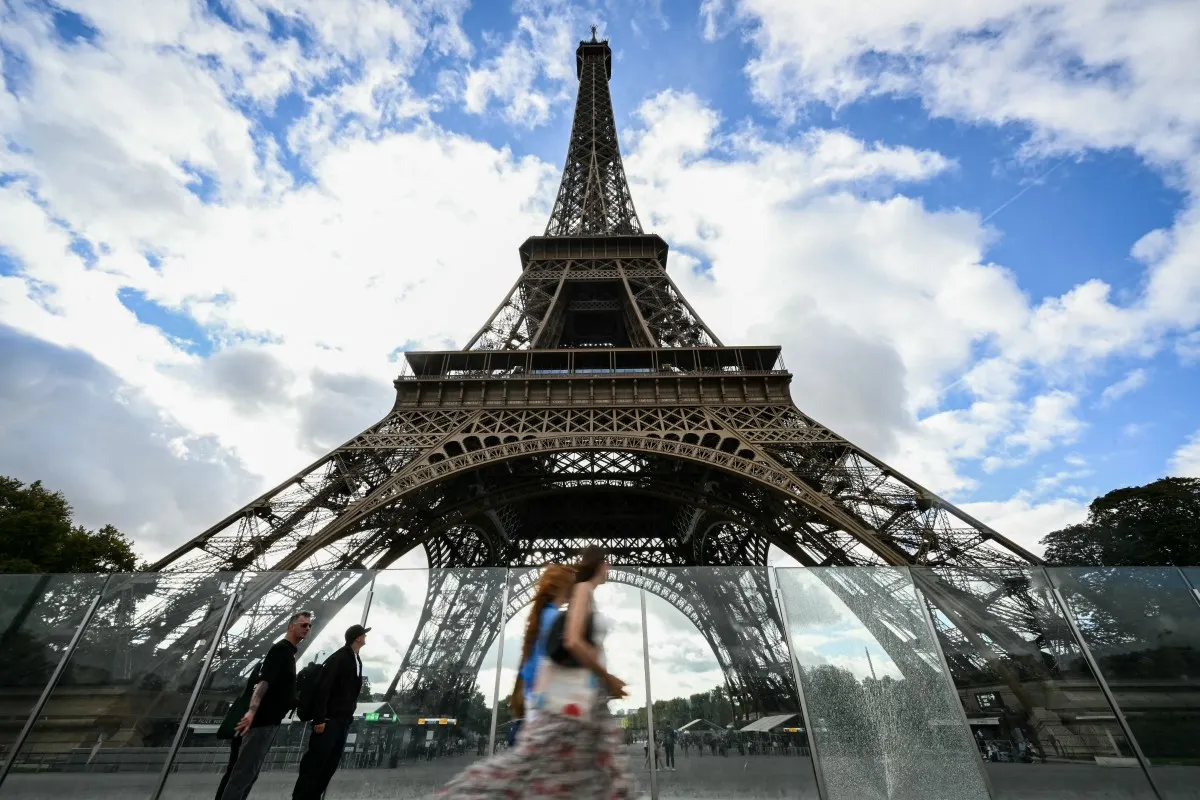 Eiffel Tower operator says chief will step down after uproar over removed women staff