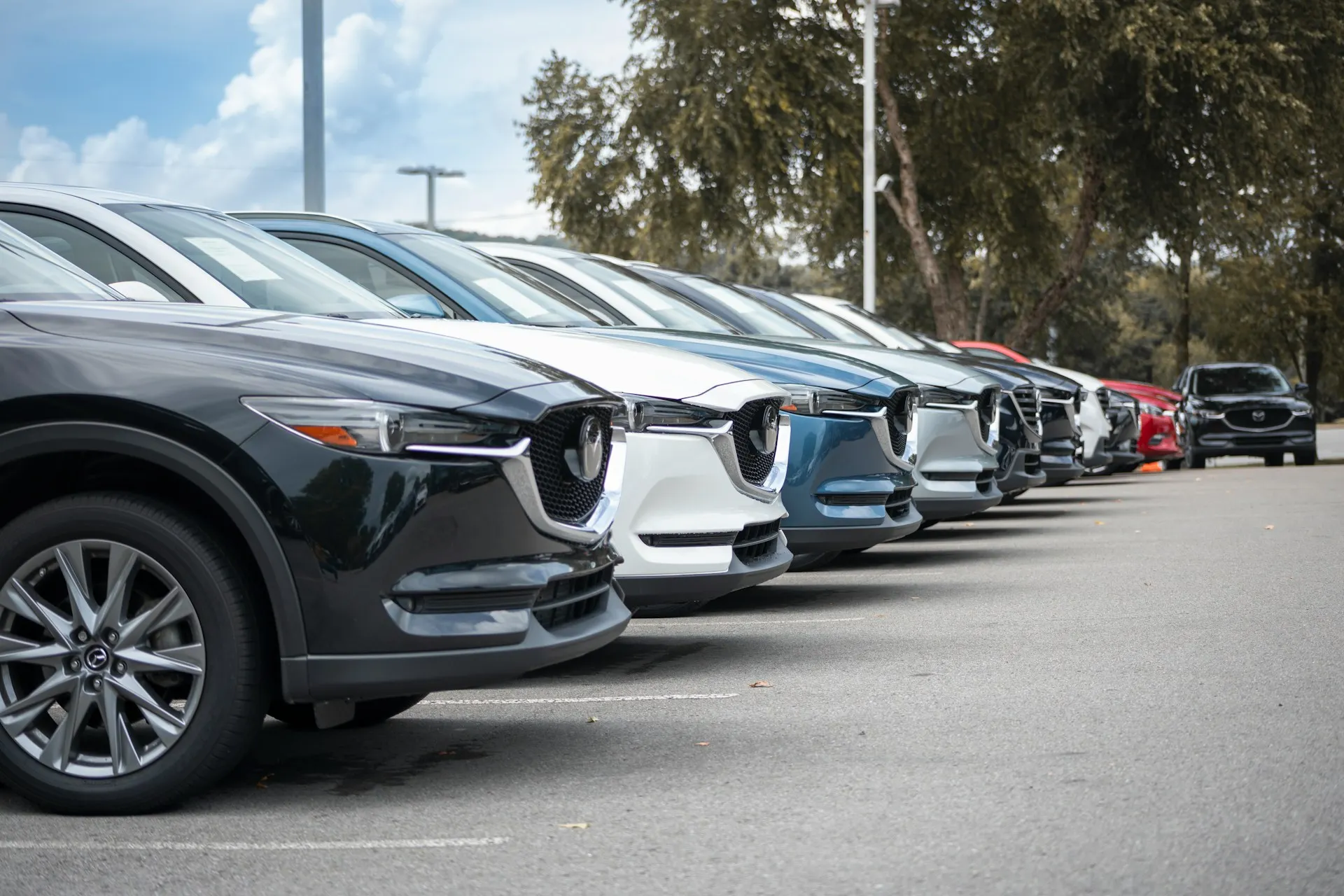 Is it better to buy a new or used car in Italy?