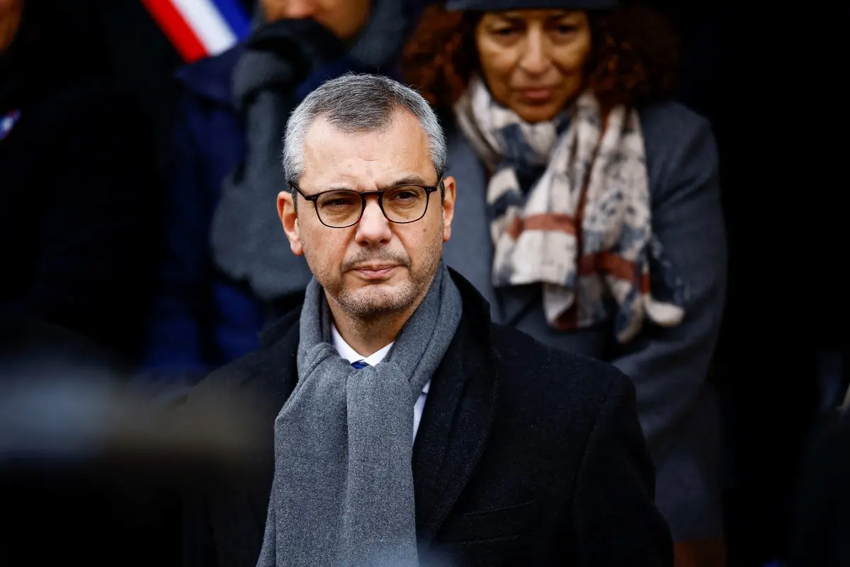 Top Macron aide can face conflict of interest trial court rules