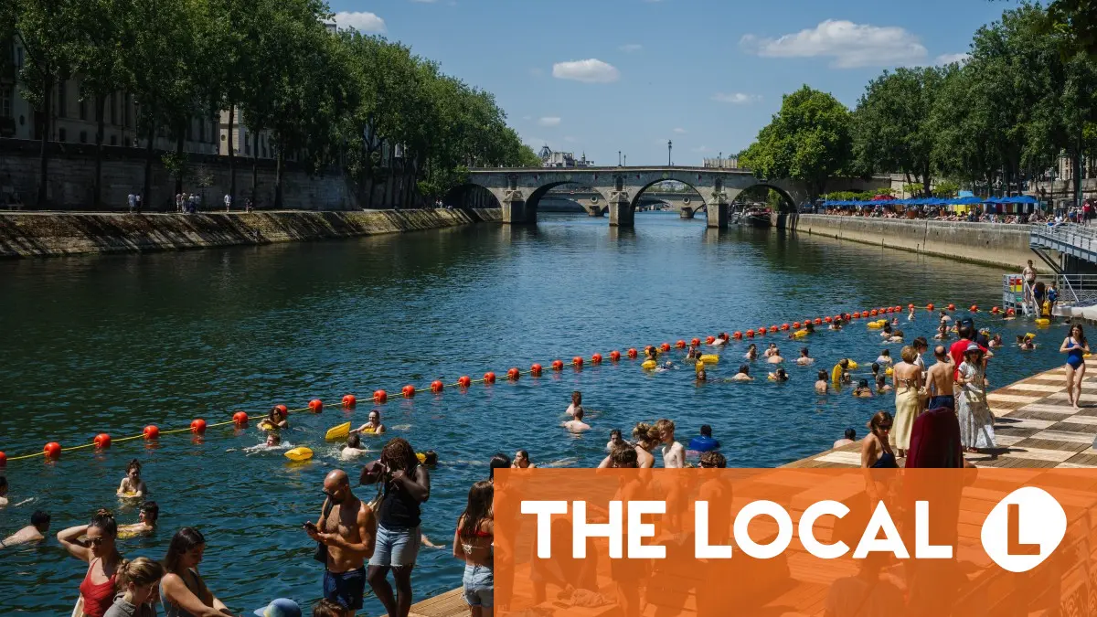 Seine draws thousands of Paris swimmers despite rainy July