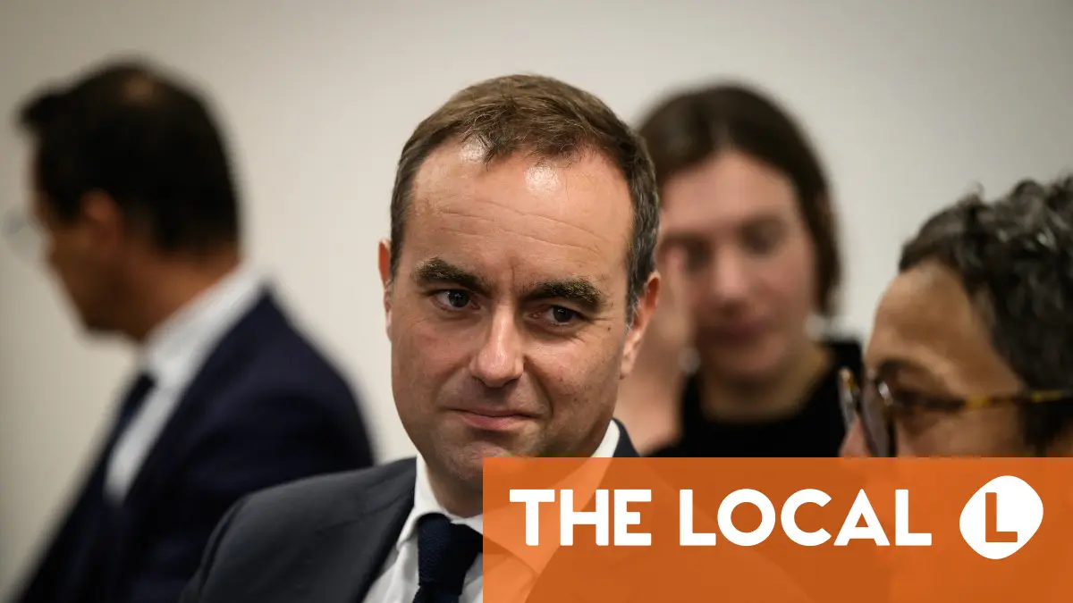 France’s new PM courts the left a day after scores downgrade