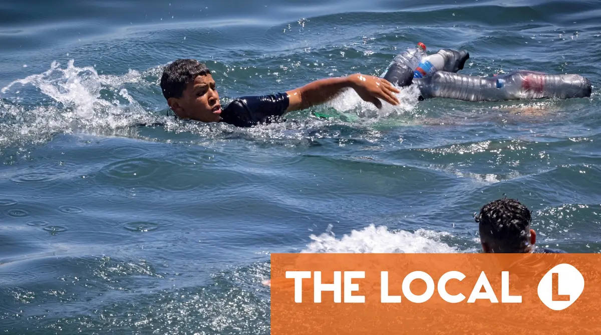 Thousands of migrants cross from Morocco into Spain's Ceuta territory