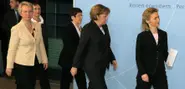 Merkel calls for more women to join politics