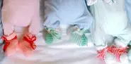 Rare identical triplets born in Bonn