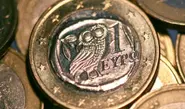 Berlin eyes 'firewall' to contain Greek debt crisis