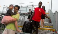 'It was racist to stop refugee luggage porters'
