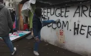 Clashes in Berlin as refugees tear down camp