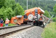Regional train hits truck, 33 injured