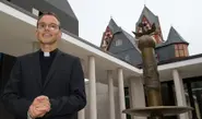 'Bling Bishop' moves into luxury Bavarian flat