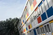 Refugees take up home in Berlin 'container town'