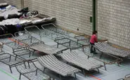 Sports halls empty as refugee integration enters new phase