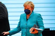 Merkel hopes history won't brand her 'lazy'
