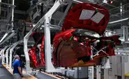 German industrial output rises but conflict darkens outlook