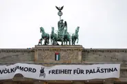 Pro-Palestinian activists use lift to scale Berlin's Brandenburg Gate
