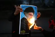 German chancellor says Iran regime living its 'last days'