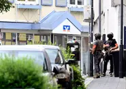 Germany bank robber on the run after hostage scare