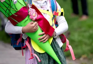 What financial help can families get for school costs in Germany?