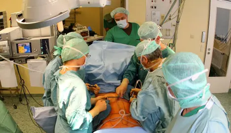 Hospital pays damages for removing woman's healthy breast