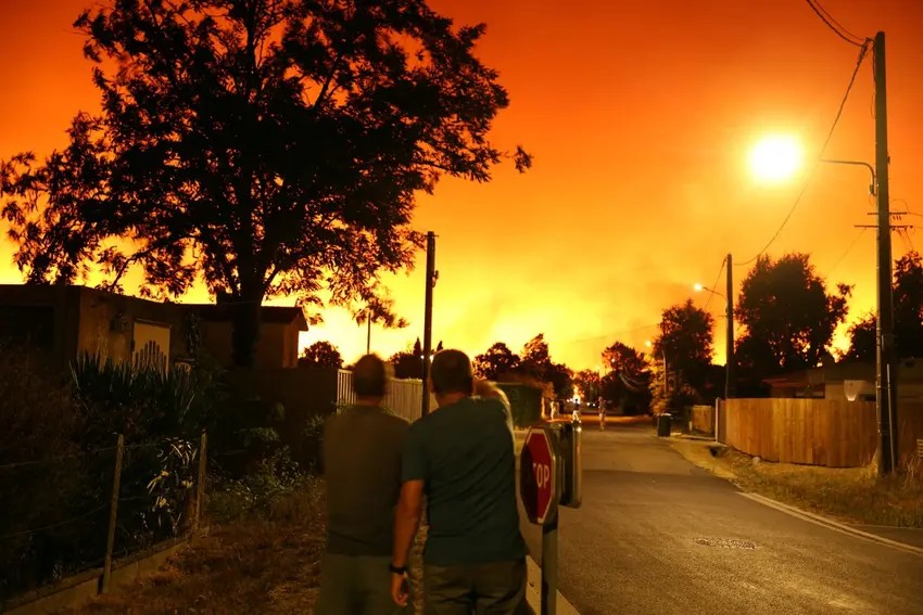 Deadly wildfires force thousands from homes in Europe